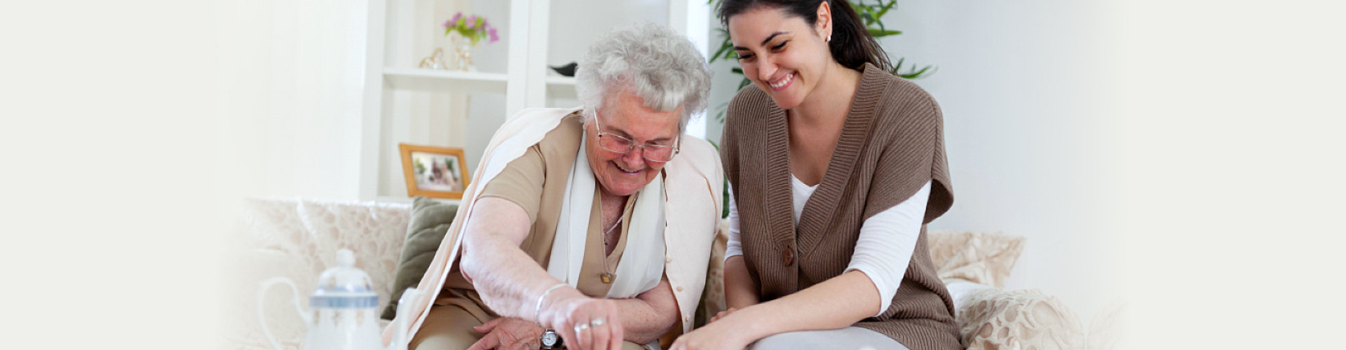 adult and senior woman smiling